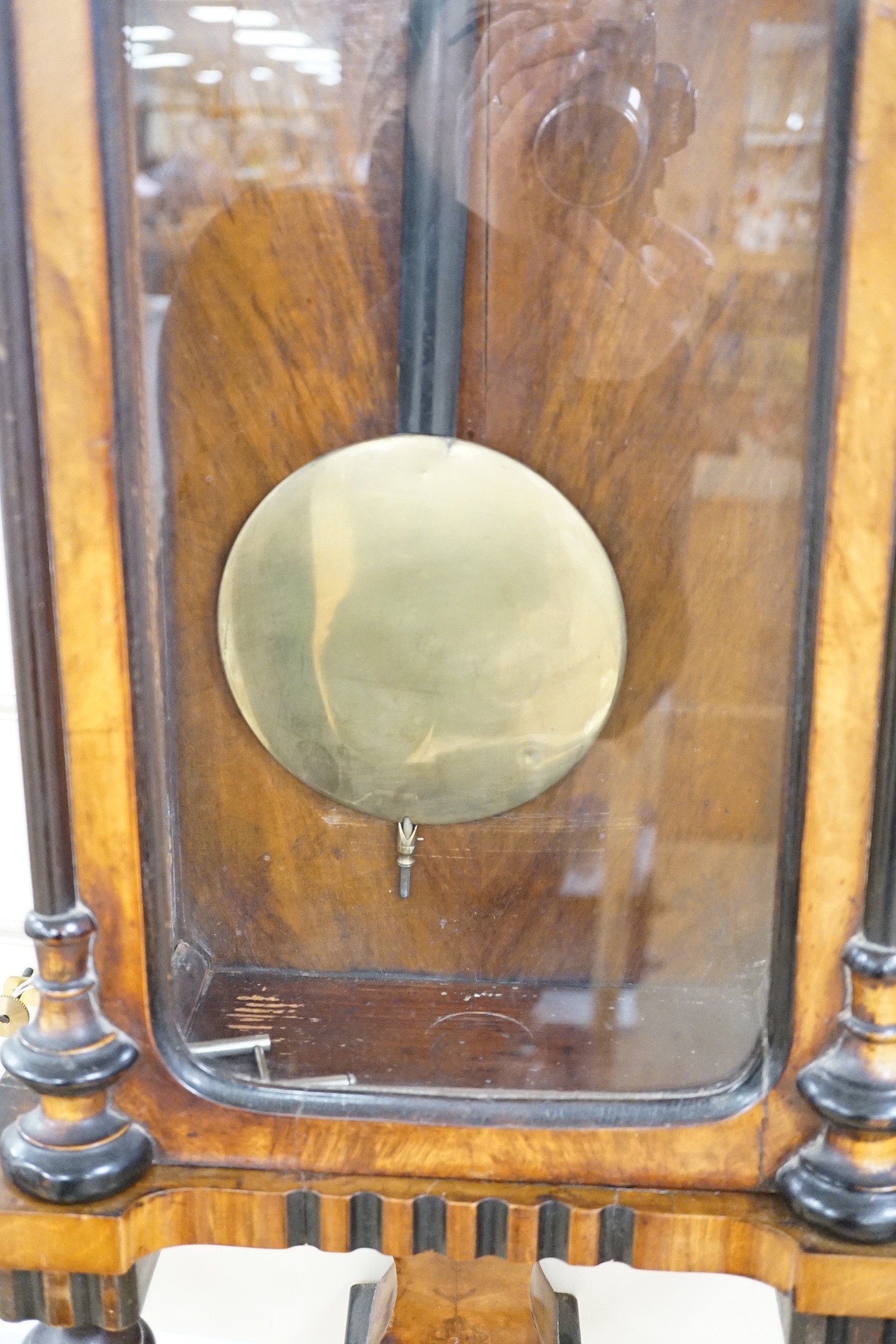 A walnut and ebony cased Vienna wall clock, 130cms high